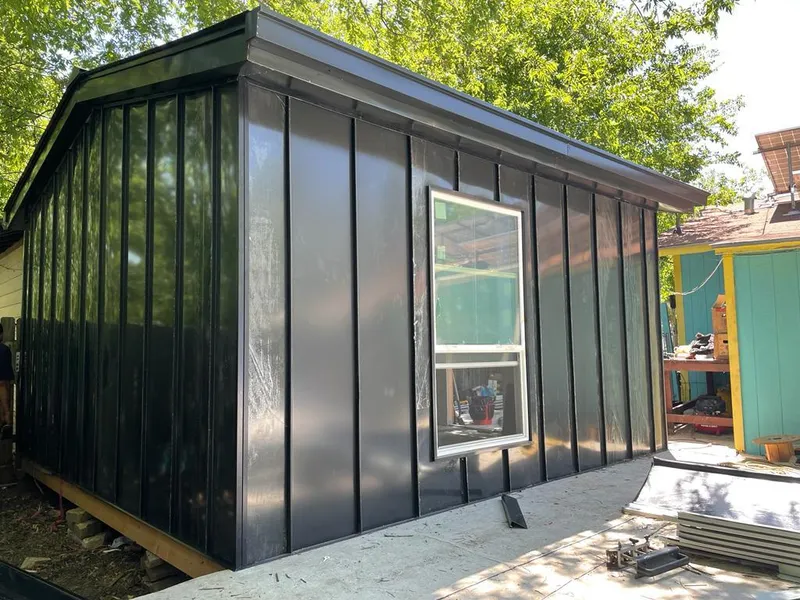 Black standing seam metal wall panels for Metal Roof Installation in Galt