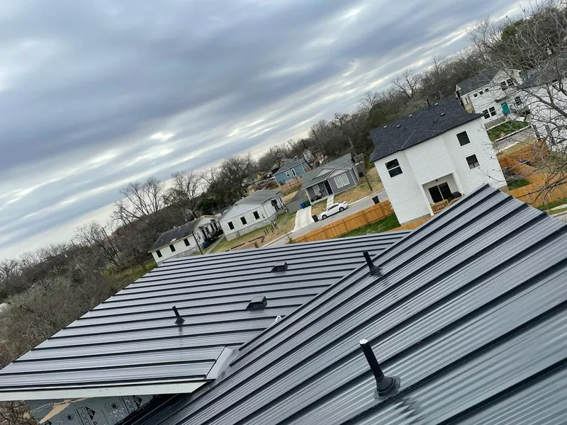 Standing seam metal roof panels with vents for Skylight Repair in Galt